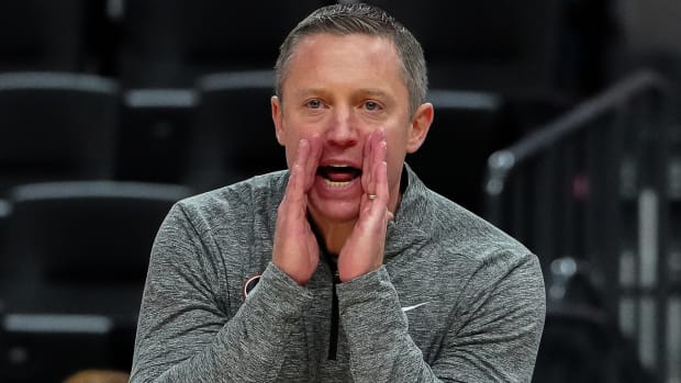 Florida coach Mike White in Las Vegas against Oregon